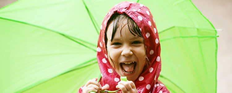 Little girl in the rain